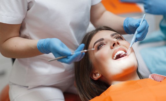a patient undergoing a dental checkup in Rockwall