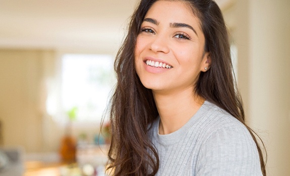 Woman smiling after smile makeover in Rockwall