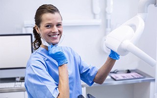 Dental hygienist smiles