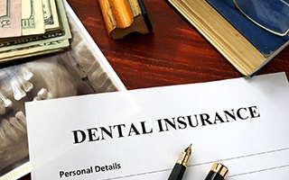 Dental insurance form resting on a table