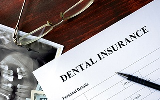 Insurance paperwork for the cost of dental implants in Rockwall