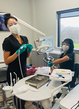 Woman smiling after restorative dentistry