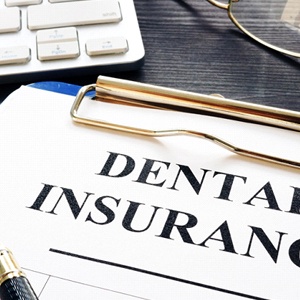 Insurance paperwork for the cost of Invisalign in Rockwall