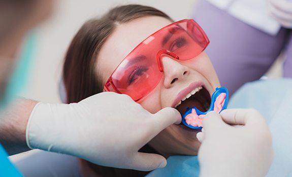 Patient receiving fluoride treatment