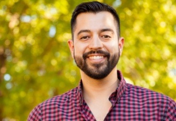 Man with perfectly aligned smile after orthodontics