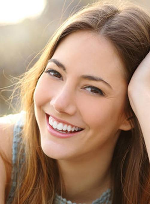 Woman smiling before her wisdom tooth extraction in Rockwall, TX