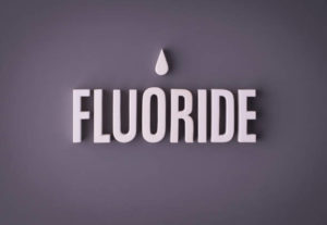 Fluoride on gray background